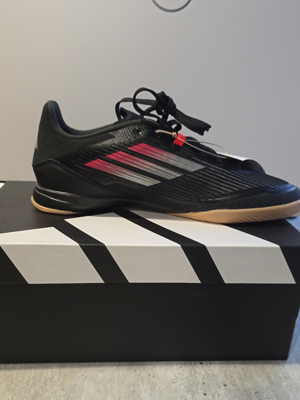 adidas Black Indoor Soccer Shoe with Pink and Silver Accents